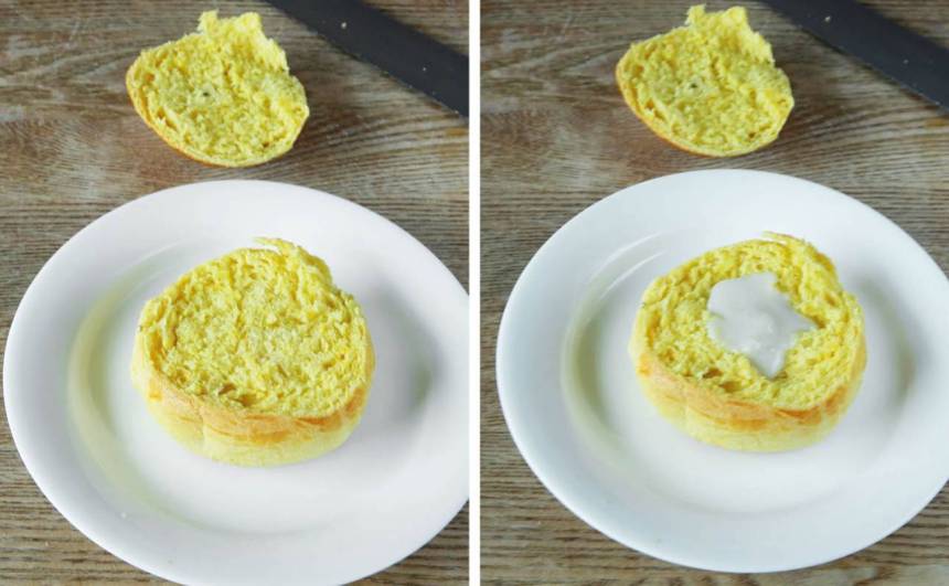 6. Skär ett lock på bullarna. Gröp ur lite inkråm ur bottnen på bullarna. Mosa ihop mandelmassa med mjölk till en kladdig massa. Lägg en klick fyllning i gropen på varje bulle.